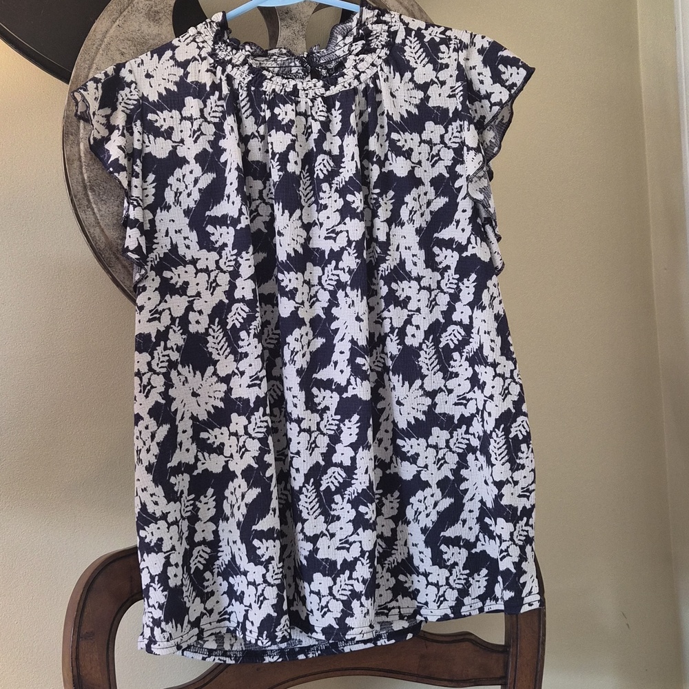 Summer blouse ruffled, top cool and breezy and sophisticated with smocked collar